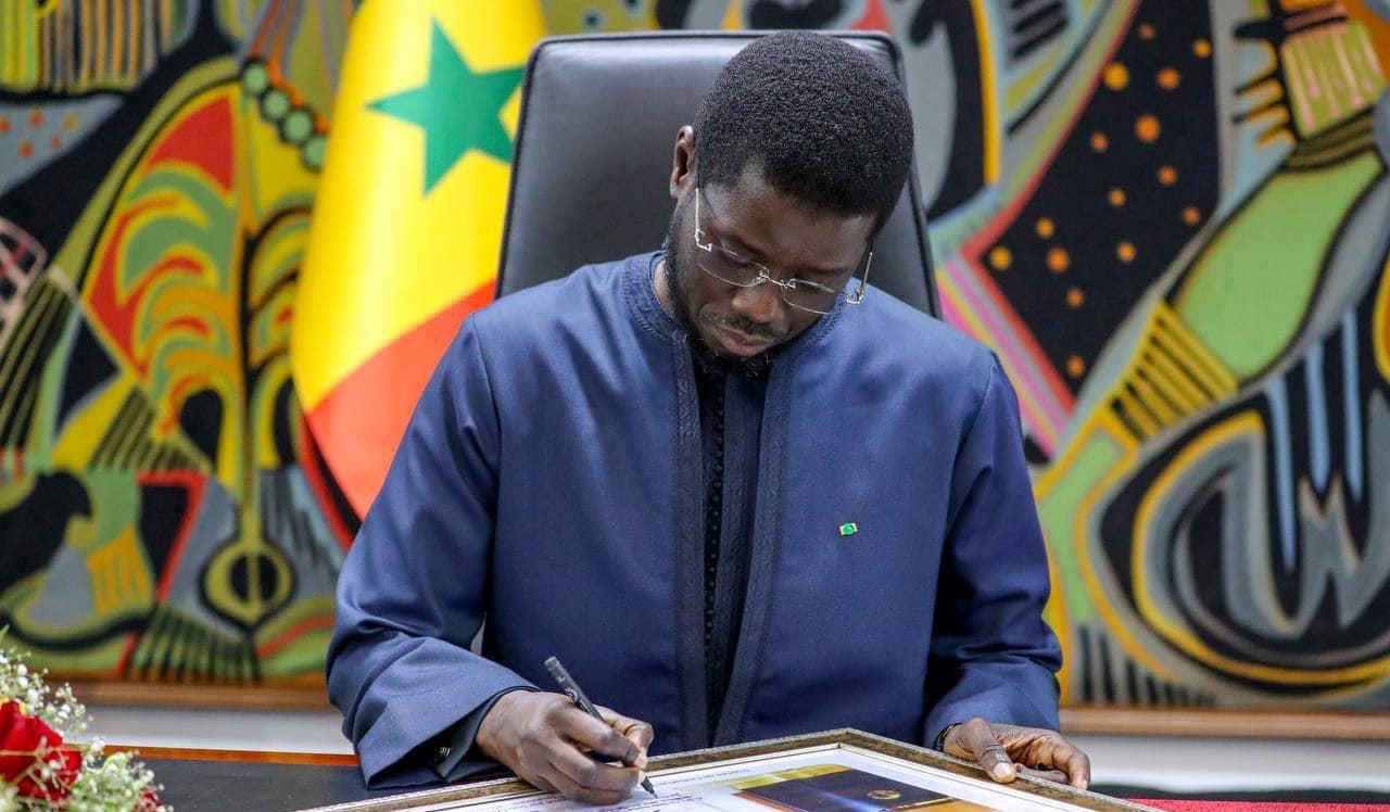 President Bassirou Diomaye and General Pape Cissé at a nomination signing