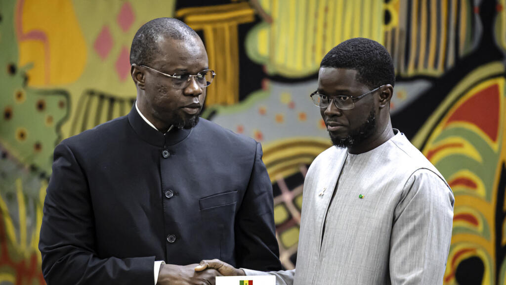 Ousmane Sonko (left), outgoing Senegalese Prime Minister, and Bassirou Diomaye Faye (right), President of Senegal, at the Presidential Palace in Dakar on 16 October 2025.