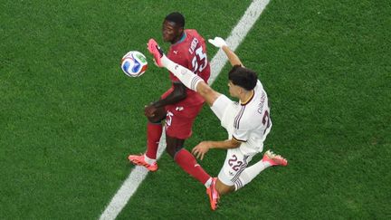 Portuguese defender Nuno Mendes battling Spanish player during the 2026 World Cup eighth final clash on July 6