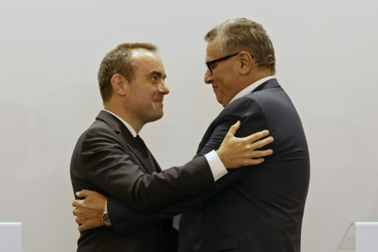 French Prime Minister Sébastien Lecornu and Moroccan counterpart Aziz Akhannouch embrace after a joint press briefing