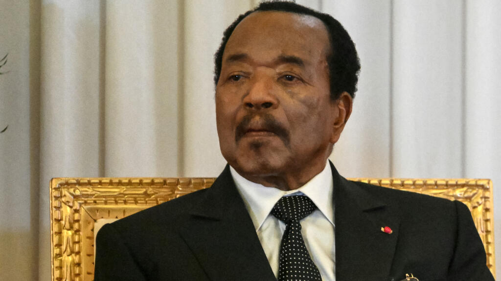Cameroonian President Paul Biya watches Pope Leo XIV (not pictured) deliver a speech at the presidential palace in Yaoundé during the third day of an 11-day apostolic journey in Africa on April 15, 2026.