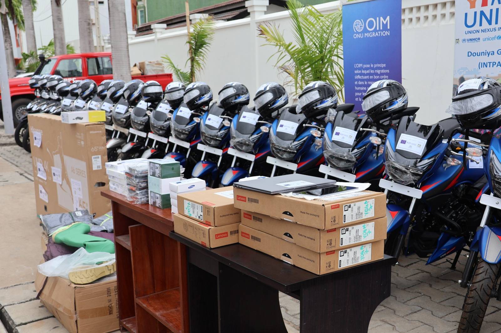 OIM hands over emergency vehicles and equipment to Benin’s civil protection agency during a ceremony in Cotonou